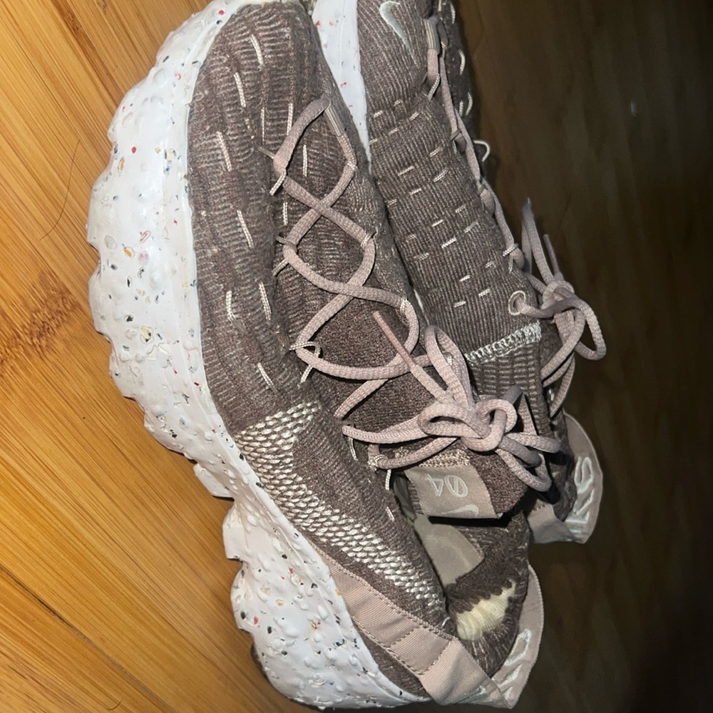 Brown Nike running shoes